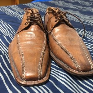 Men’s brown dress shoes.